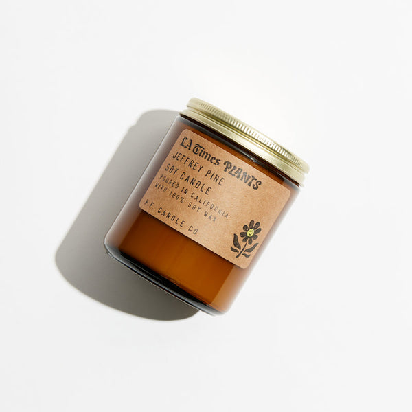 P.F. Candle Co. Jeffrey Pine Walnut for LA Times Plants Standard Candle - Product - Hand-poured into apothecary inspired amber jars with our signature kraft label and a brass lid.
